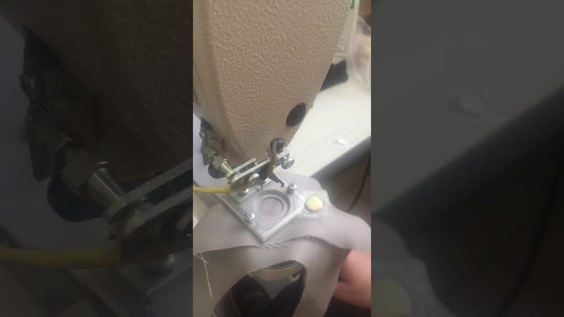 Automated solution for sewing on a laser-marked magnet video