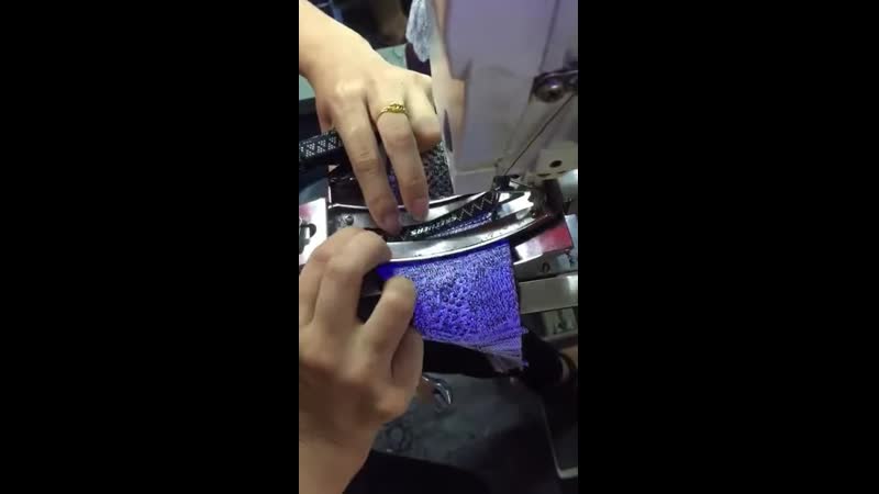 Sewing a tape-label on the tongue of a sneaker using a bartacking machine video