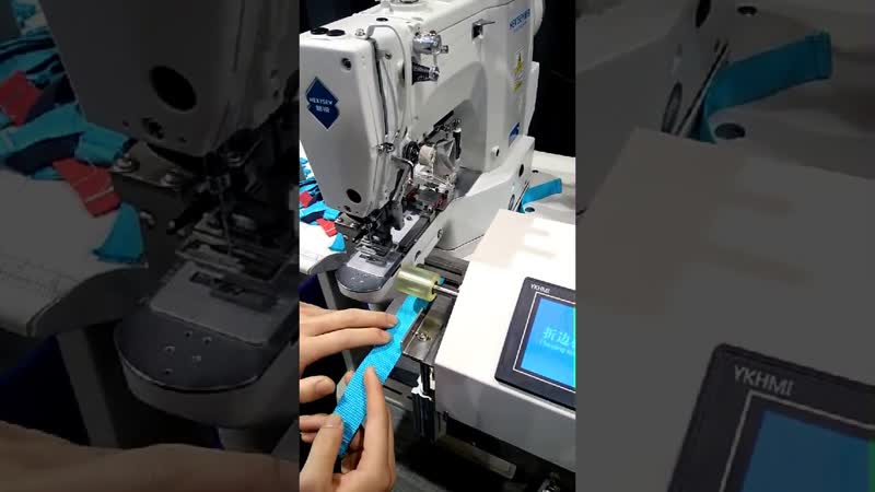 The sewing machine folds and sews the sling into the loop AAS-430 video