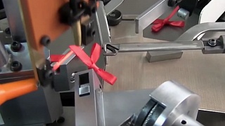 Автоматизированная машина для изготовления декортивных бантиков для нижнего белья