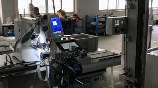 Automatic sewing machine for stitching elastic bands into a ring AAS-103E