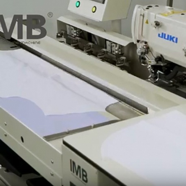 Automated solution for sewing buttonholes on a shirt shelf IMB MB 6003A