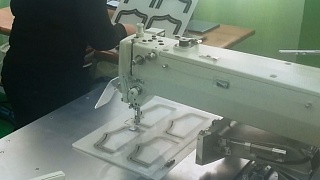 Automated solution for pocket flap stitching based on BROTHER BAS-342