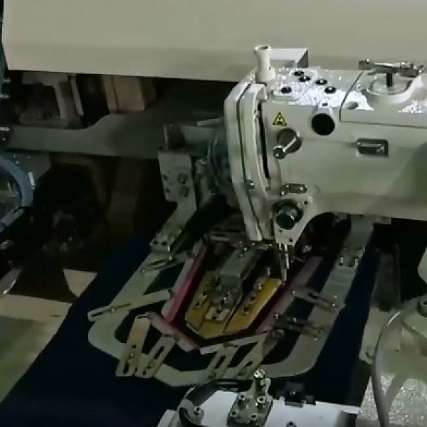 Sewing machine for hemming and stitching jeans pocket based on Brother BAS
